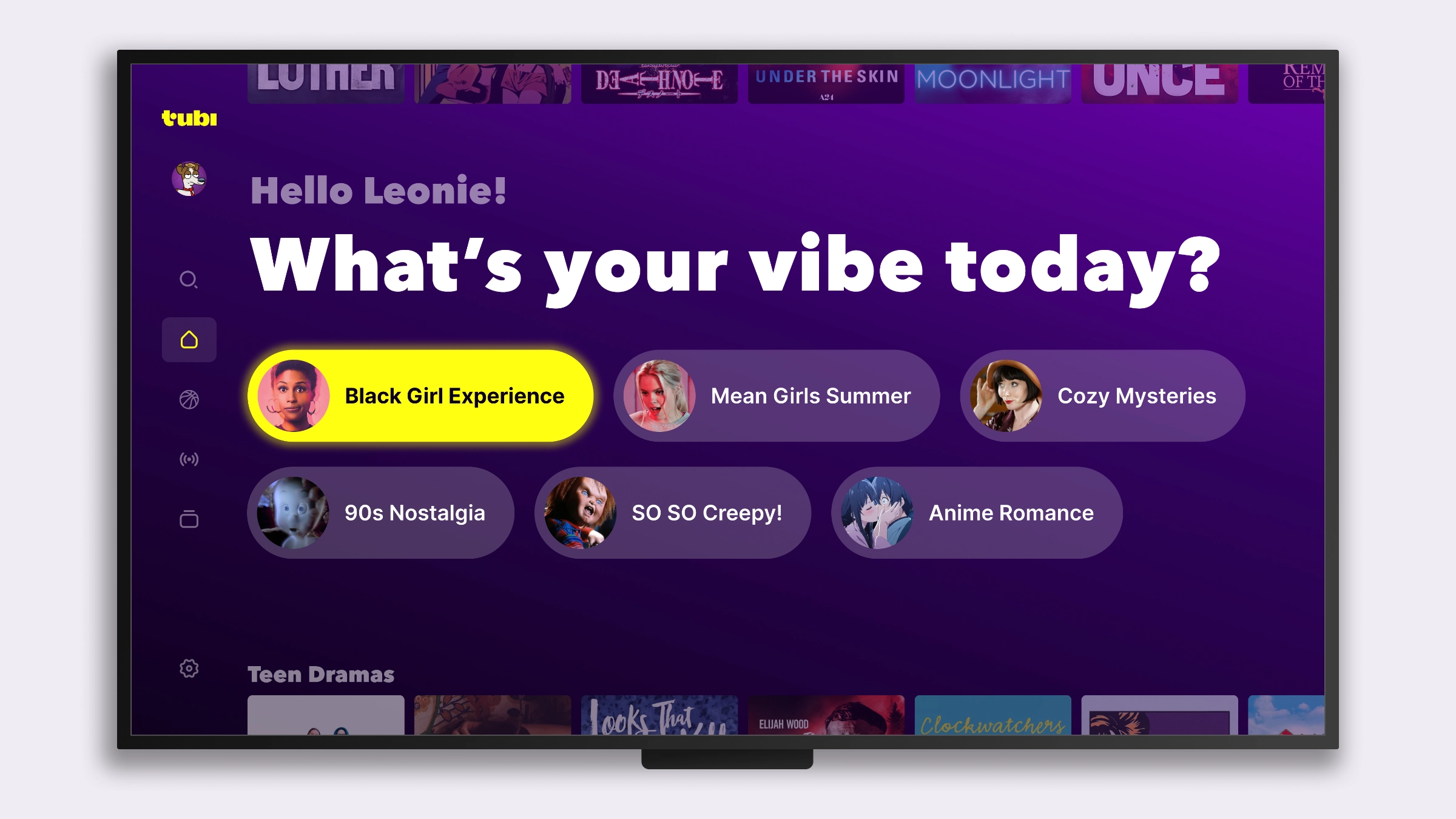 A TV app home screen with a "What's your vibe today?" section and mood-based pill buttons including "Black Girl Experience", "Mean Girls Summer", and "Cozy Mysteries"